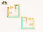 Double F & cyan enamel studs