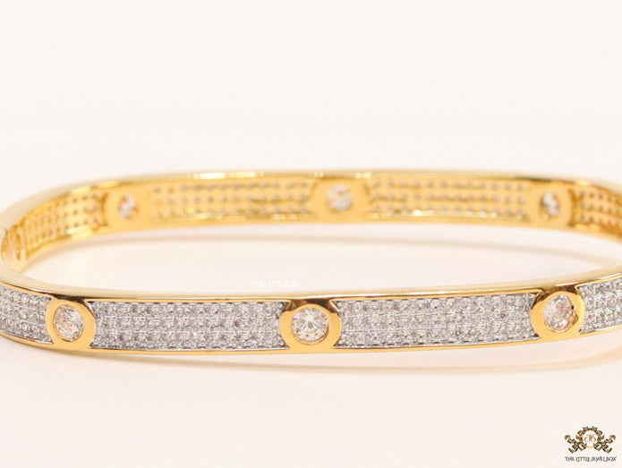 Gold plated openable bracelet studded with cz