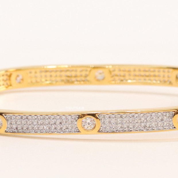 Gold plated openable bracelet studded with cz