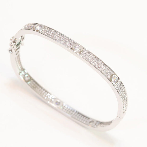 Platinum plated openable bracelet studded with cz