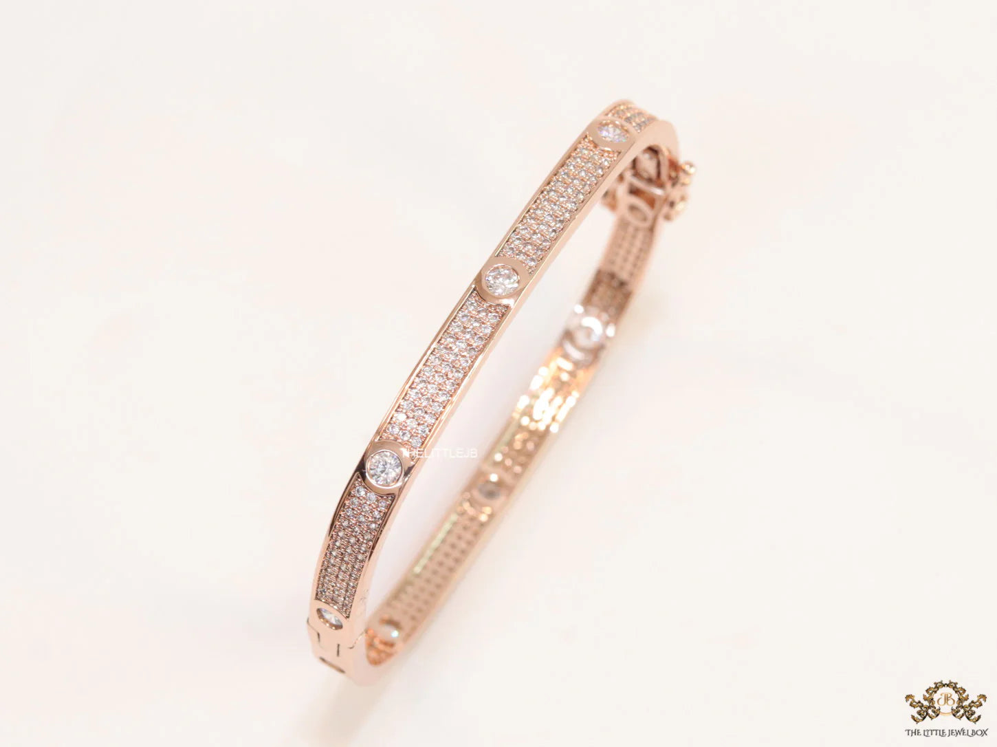 Rose Gold plated openable bracelet studded with cz
