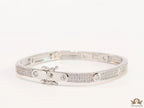Platinum plated openable bracelet studded with cz