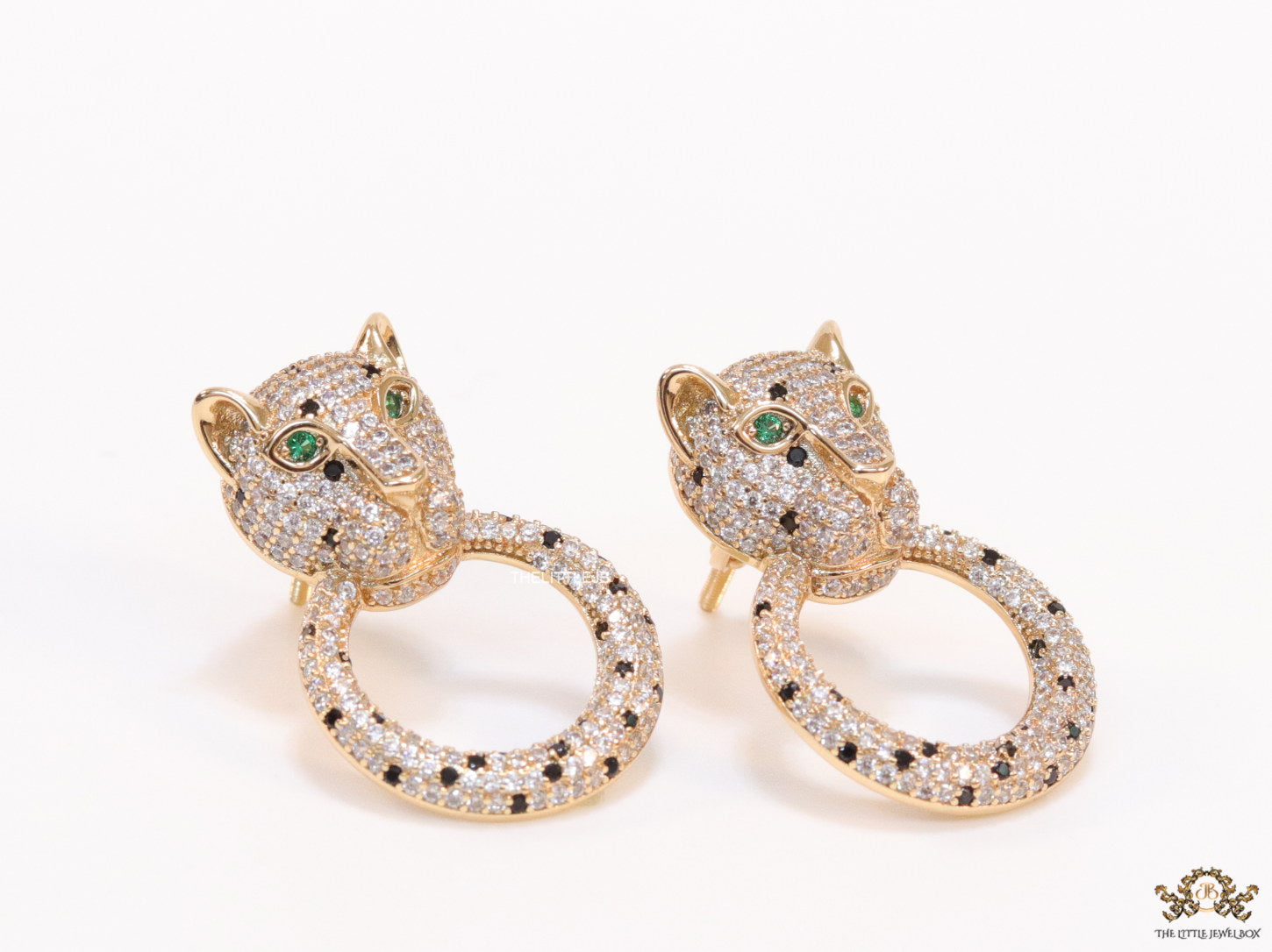 Cz panther face with ring studs in golden finish