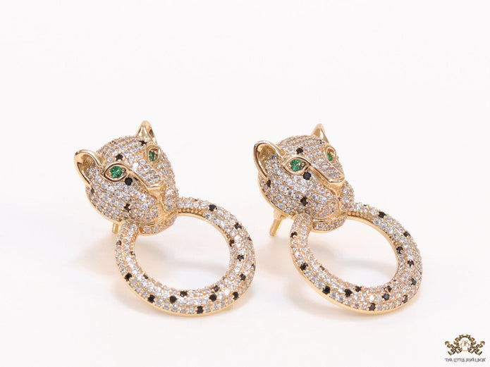 Cz panther face with ring studs in golden finish