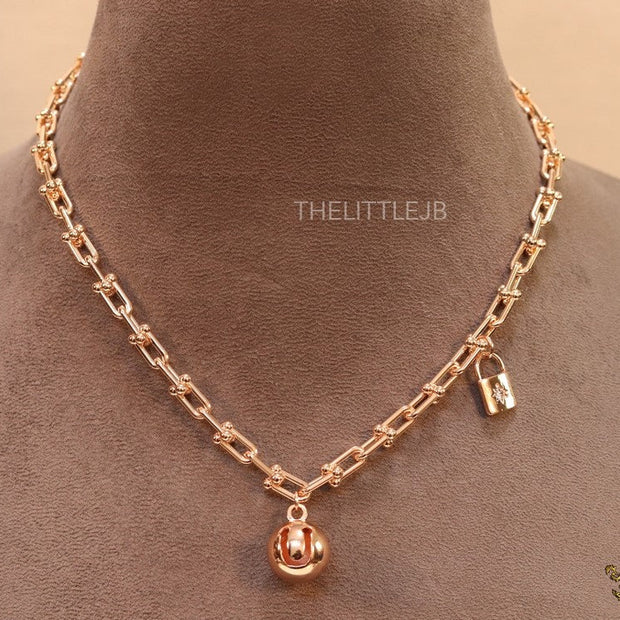 Gold plated padlock and chime necklace