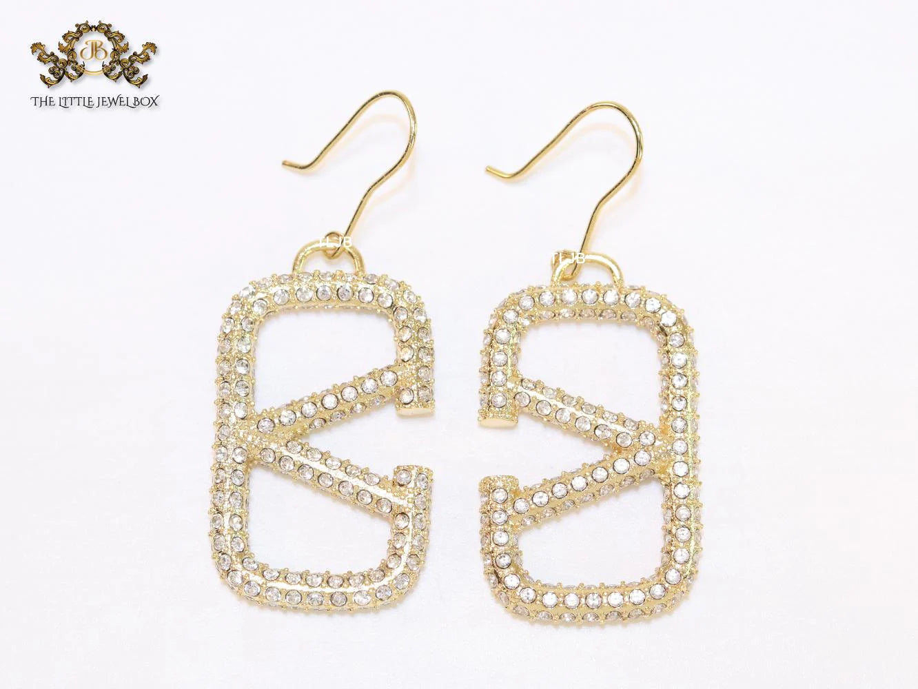 Alphabet open V cz and gold danglers