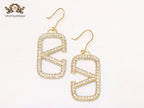 Alphabet open V cz and gold danglers