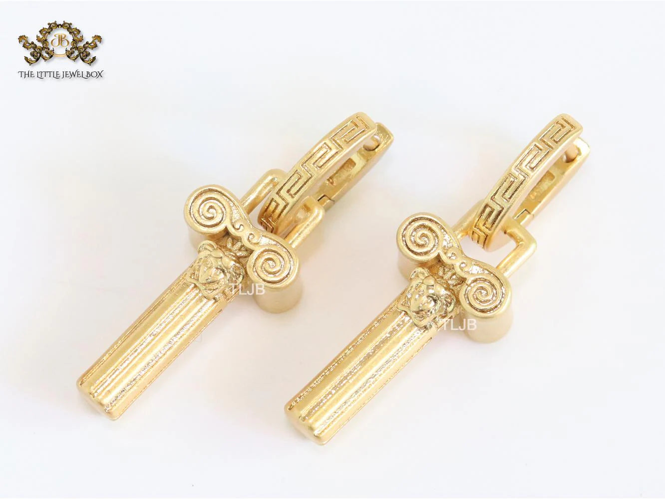 Medusa embossed gold key hoops