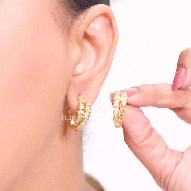 Gold serpentine hoops