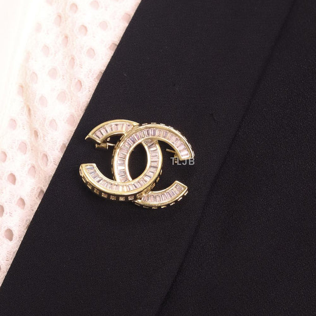 Double C gold baguette brooch