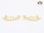 Alphabet L and V ear-cuffs in gold