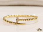 Gold plated openable nail bracelet with cz and metallic beads