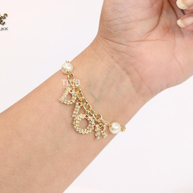 Alphabet D gold and cz bracelet