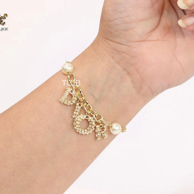 Alphabet D gold and cz bracelet