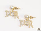 Gold plated pearl studs with cz alphabet drops