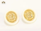 Double C gold and white enamel studs