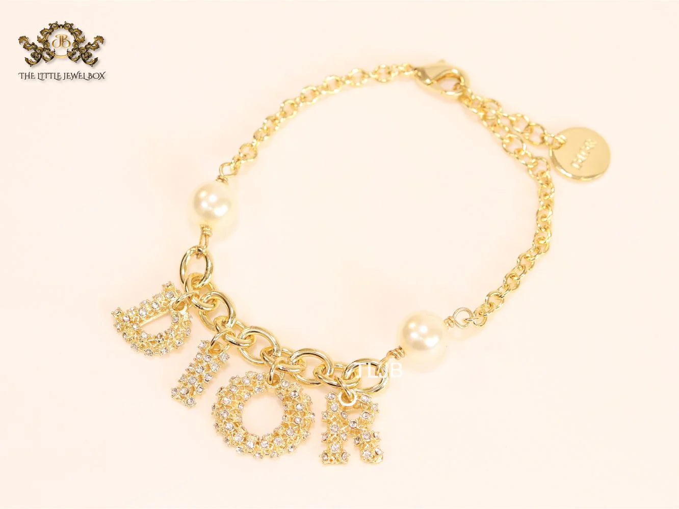 Alphabet D gold and cz bracelet