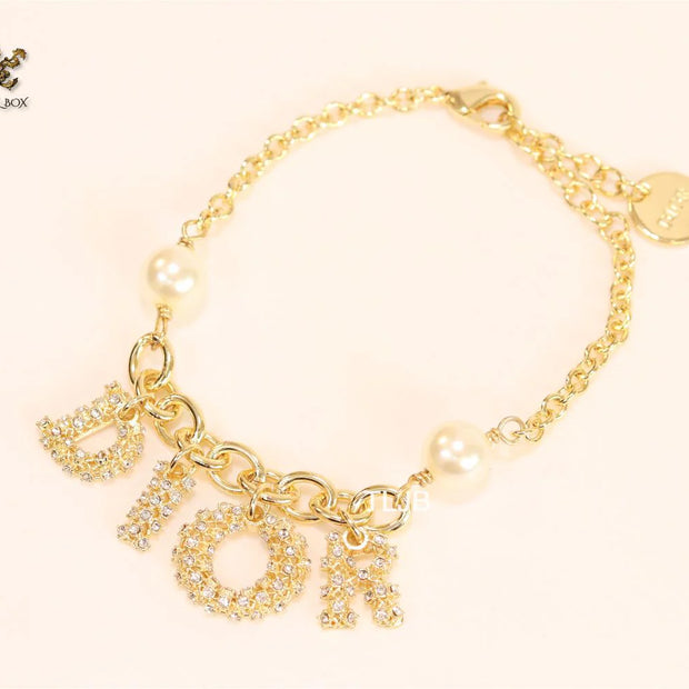 Alphabet D gold and cz bracelet
