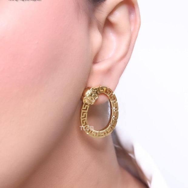 Medusa round gold studs