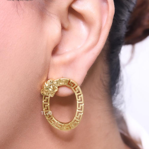 Medusa round gold studs