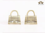 Alphabet B bag studs in platinum finish
