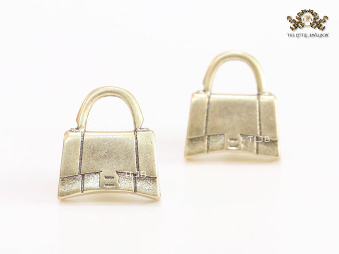 Alphabet B bag studs in platinum finish