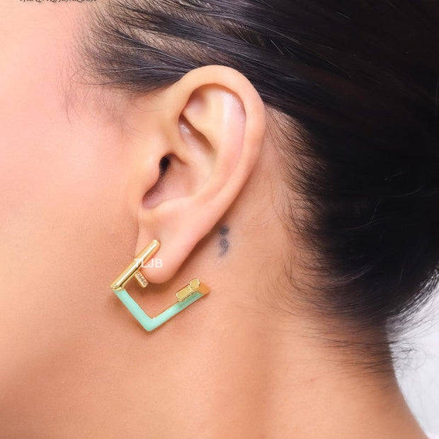 Double F & cyan enamel studs