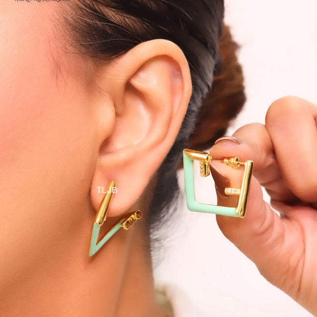 Double F & cyan enamel studs