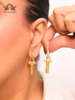 Medusa embossed gold key hoops