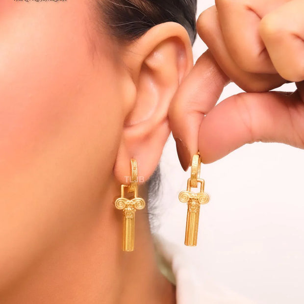 Medusa embossed gold key hoops