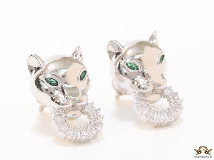 Platinum plated panther face studs with cz baguette ring