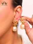 Double C pearl and gold earrings