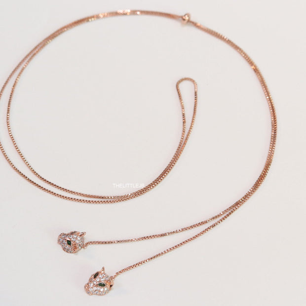 Rose gold plated knot necklace with twin cz panther pendants