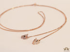 Rose gold plated knot necklace with twin cz panther pendants