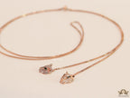 Rose gold plated knot necklace with twin cz panther pendants