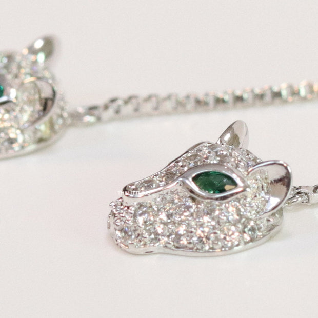 Platinum plated knot necklace with twin cz panther pendants
