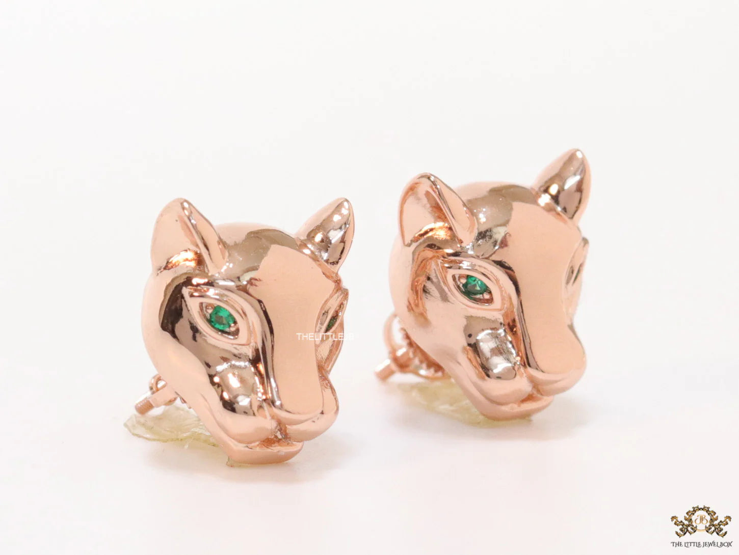 Rose gold panther face studs