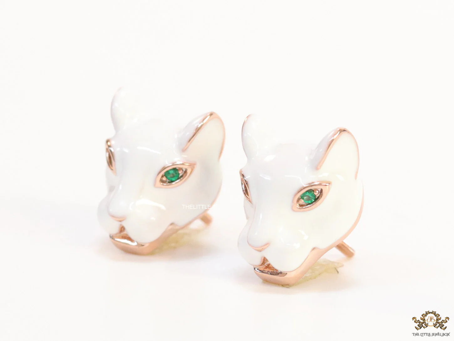 White and rose gold panther face studs