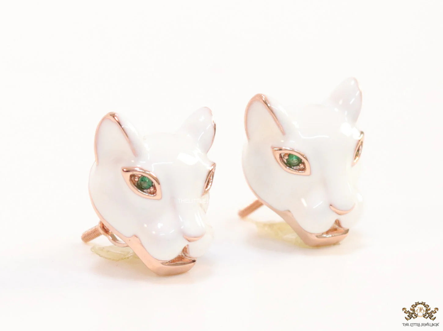White and rose gold panther face studs