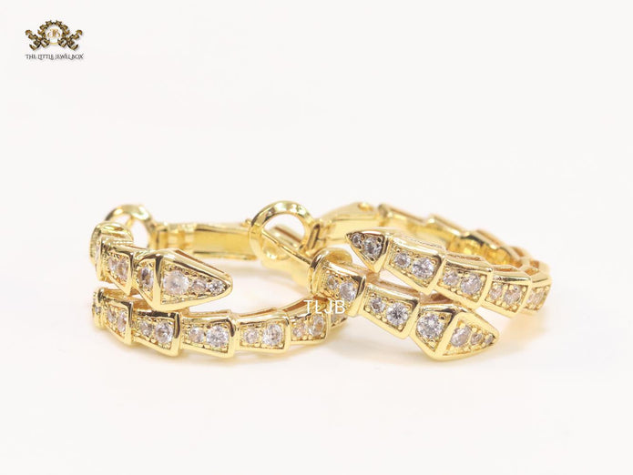 Gold serpentine hoops