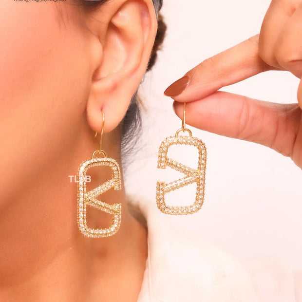 Alphabet open V cz and gold danglers