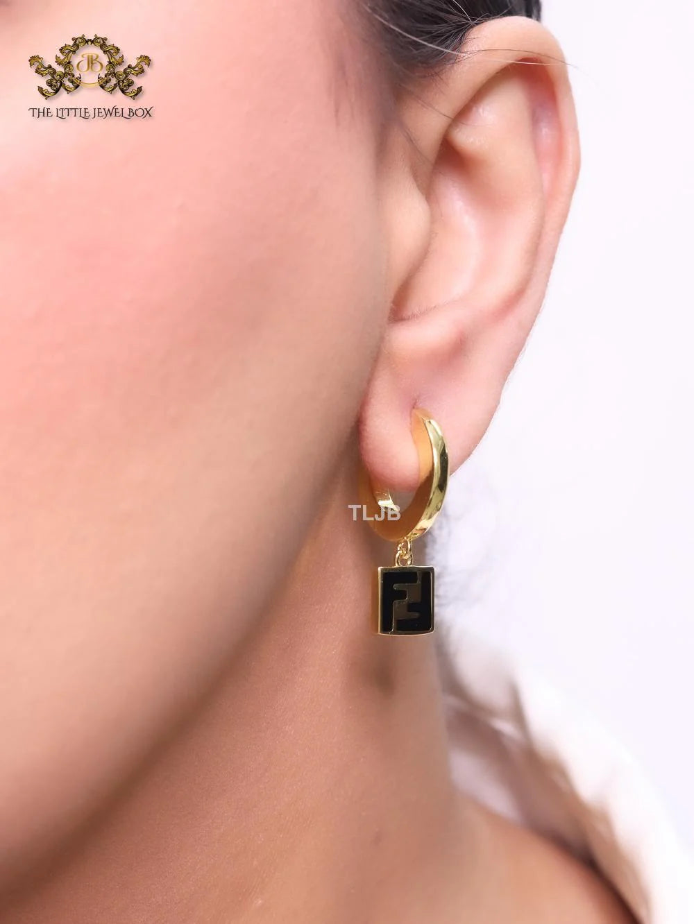 Double F black enamel and gold hoops