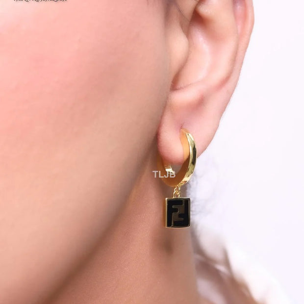 Double F black enamel and gold hoops