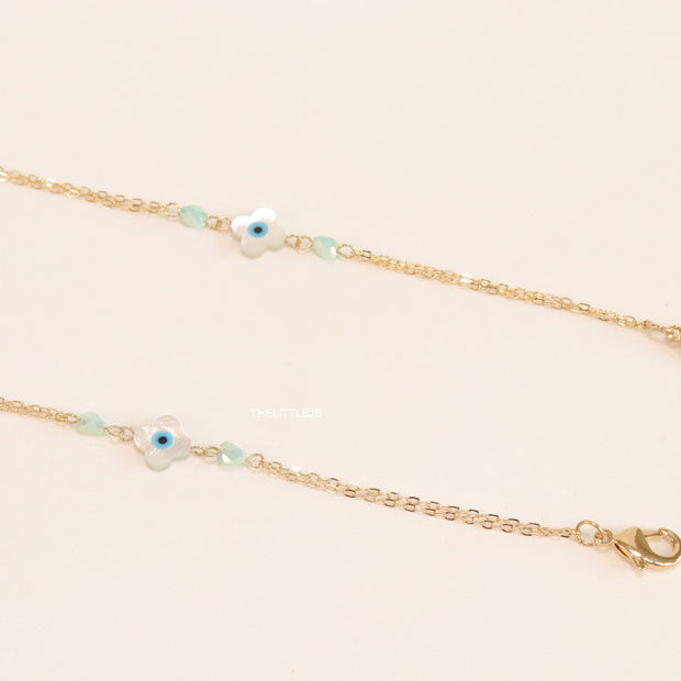 Golden mask chains with MOP evil eye clovers