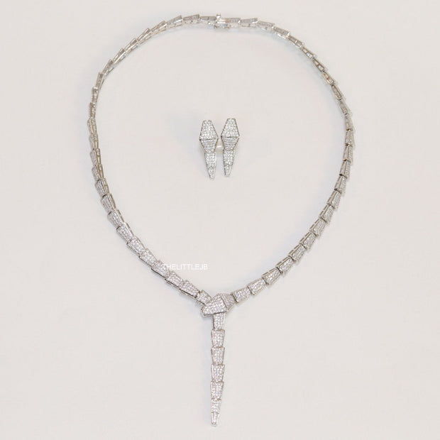 Platinum plated snake look knot necklace in cz
