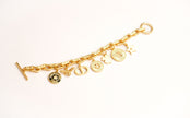Alphabet CD Charms Bracelet in Matt Gold | Luxury Fashion Accessory