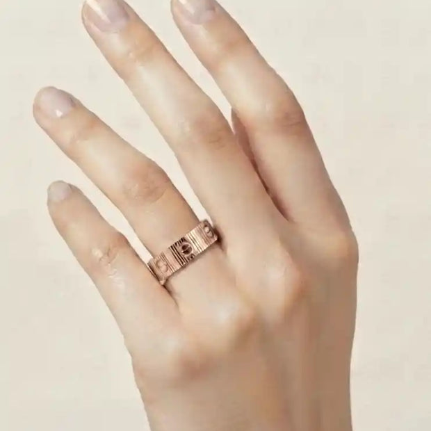 Rose gold plated screw pattern love band