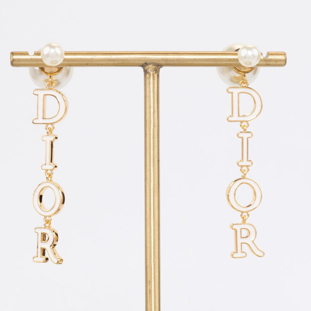 Long gold enamel alphabet C and D pearl earrings