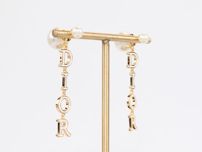 Long gold enamel alphabet C and D pearl earrings