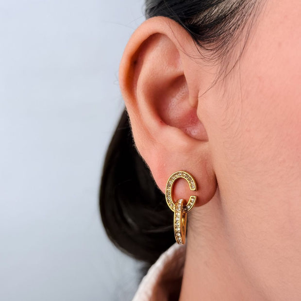 Alphabet D drop earrings in gold